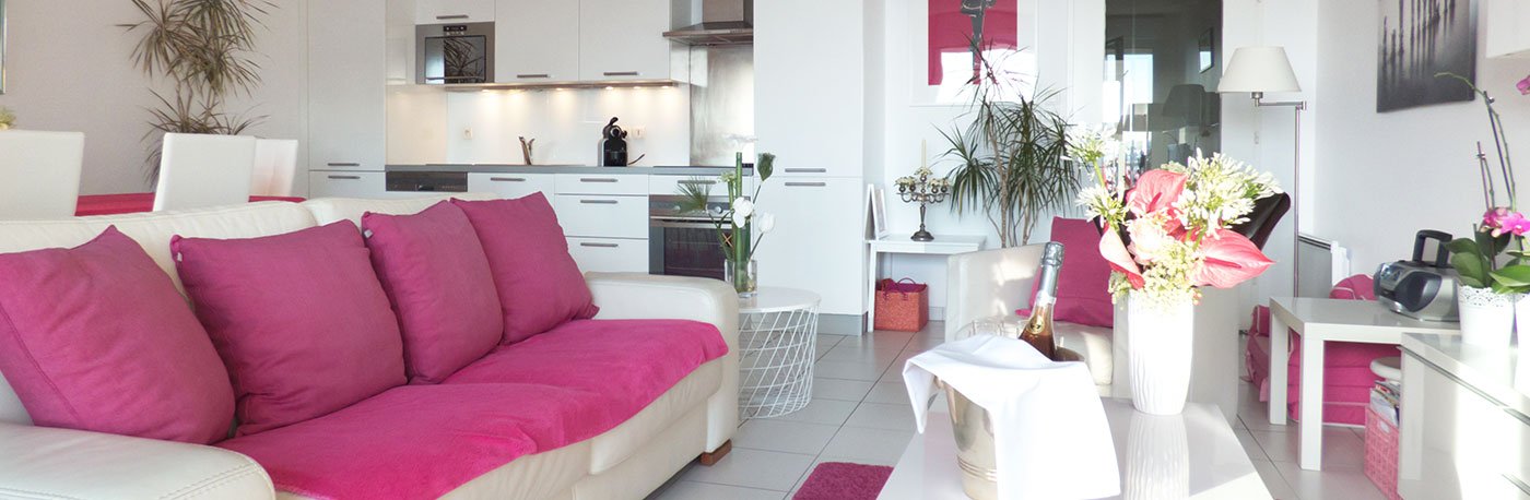 Le salon, la salle à manger et la cuisine de l'appartement Cléolympe à Saint-Malo
